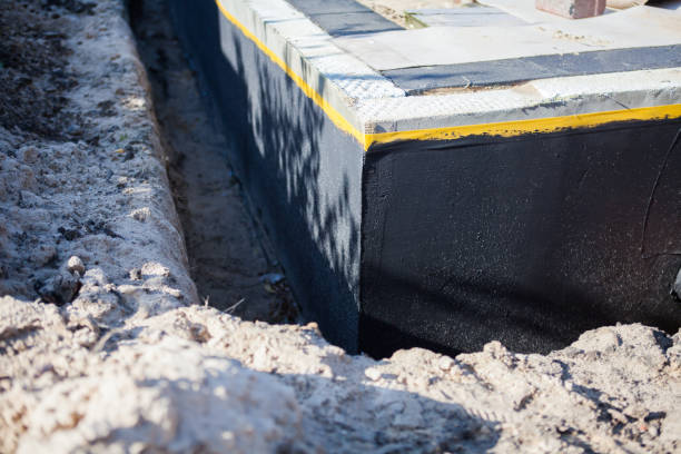 Professional Waterproofing technician working in Clinton, MD